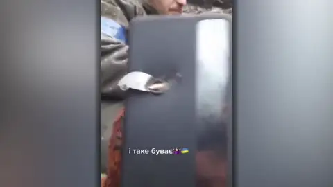 Móvil con la bala Móvil con la bala
