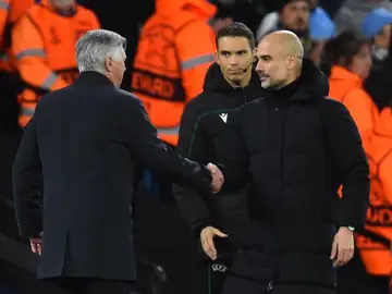 Pep Guardiola y Carlo Ancelotti durante el partido de Champions League Pep Guardiola y Carlo Ancelotti durante el partido de Champions League