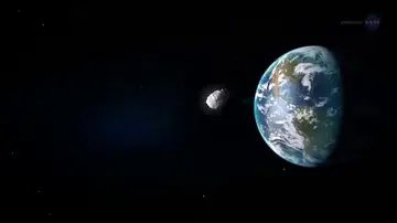 Imagen de archivo de un asteroide cerca de la Tierra Imagen de archivo de un asteroide cerca de la Tierra