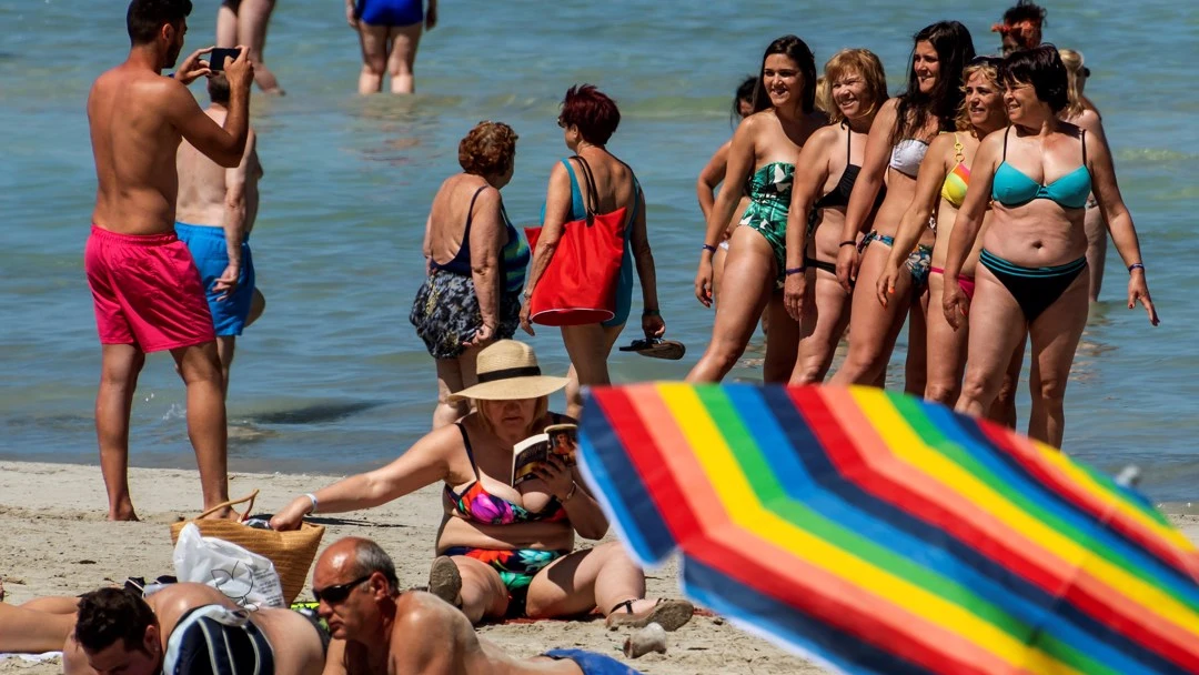 Turistas en la playa