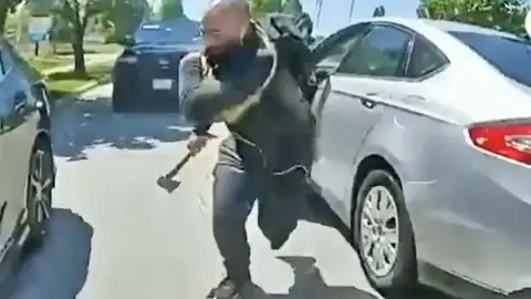 Persona con un hacha en EE.UU Persona con un hacha en EE.UU