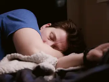 Imagen de archivo de una persona durmiendo Imagen de archivo de una persona durmiendo
