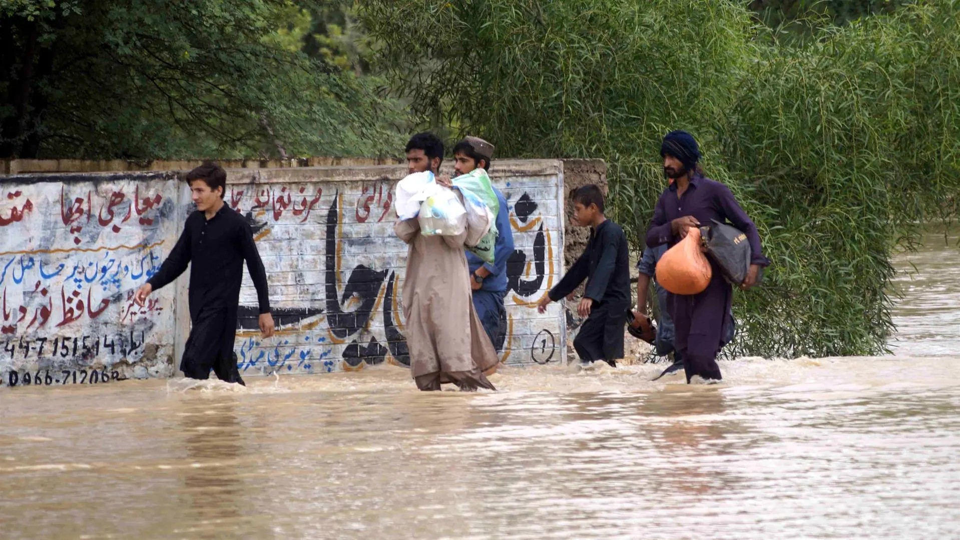 Algunos de los pakistan&iacute;es afectados por las inundaciones