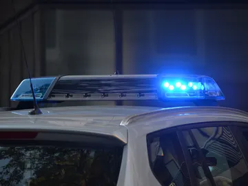 Imagen de archivo de un coche de policía Imagen de archivo de un coche de policía