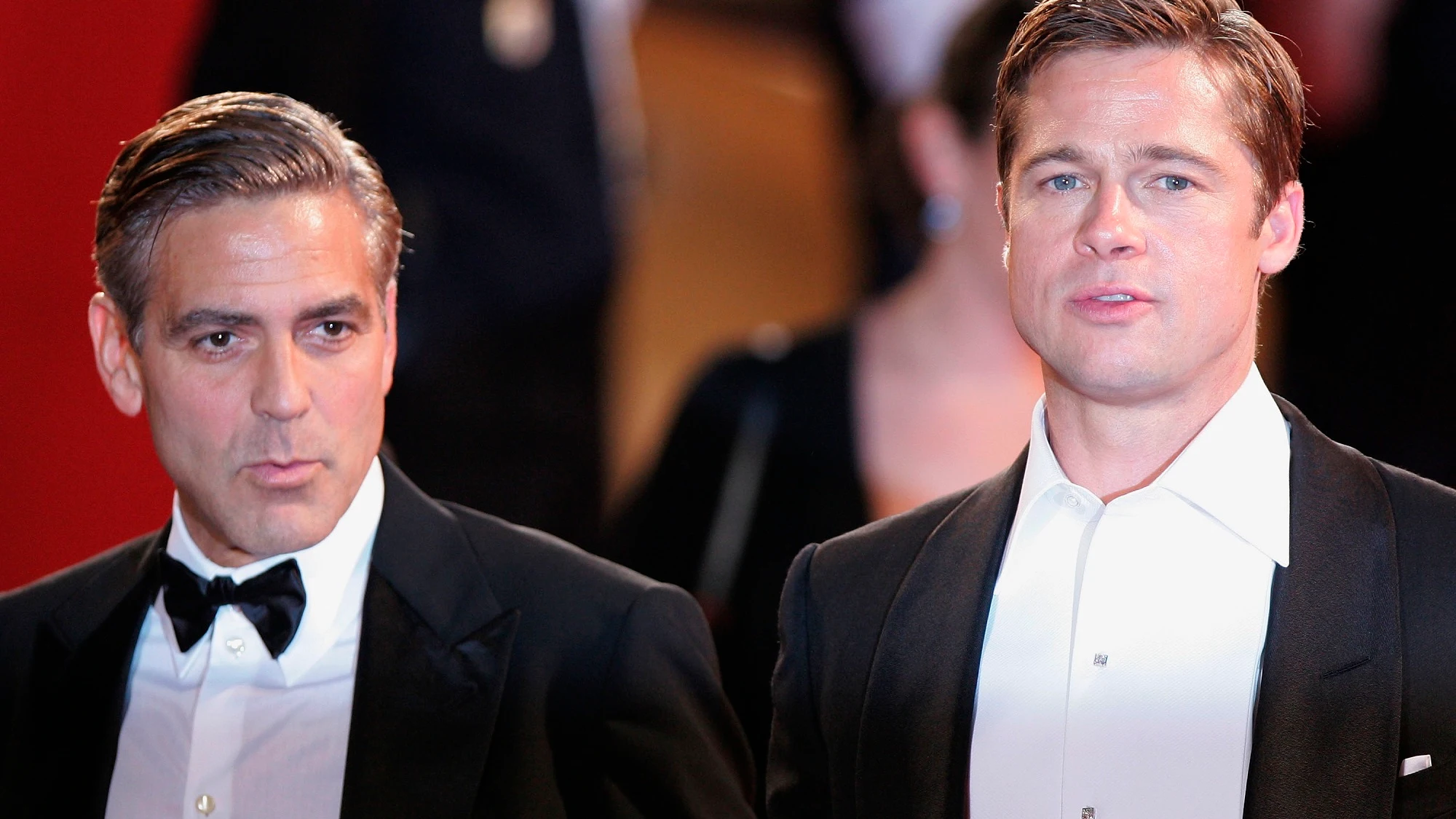 George Clooney y Brad Pitt George Clooney y Brad Pitt