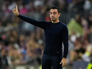 Xavi, en la banda en el partido contra el Villarreal Xavi, en la banda en el partido contra el Villarreal