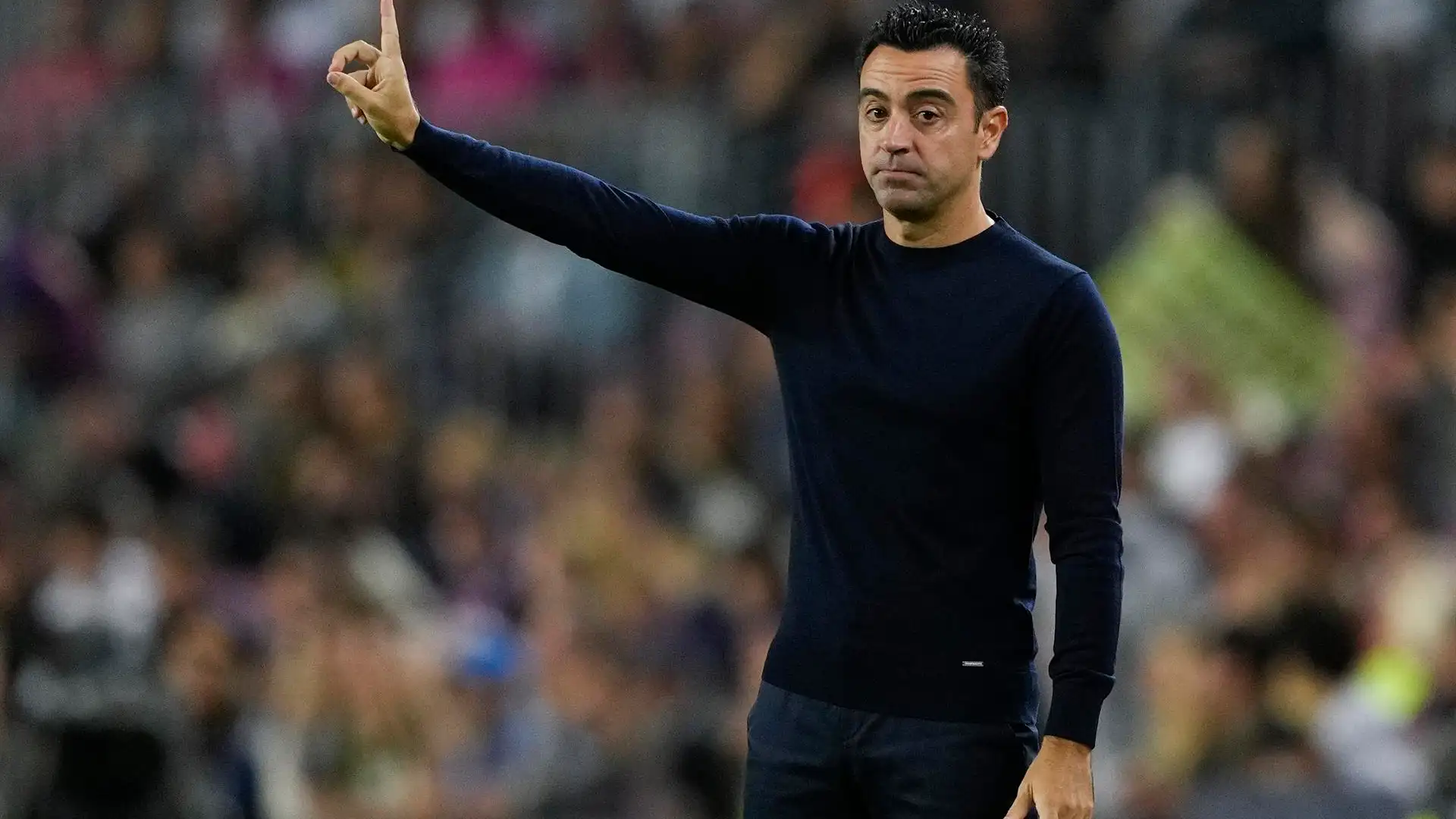 Xavi, en la banda en el partido contra el Villarreal Xavi, en la banda en el partido contra el Villarreal