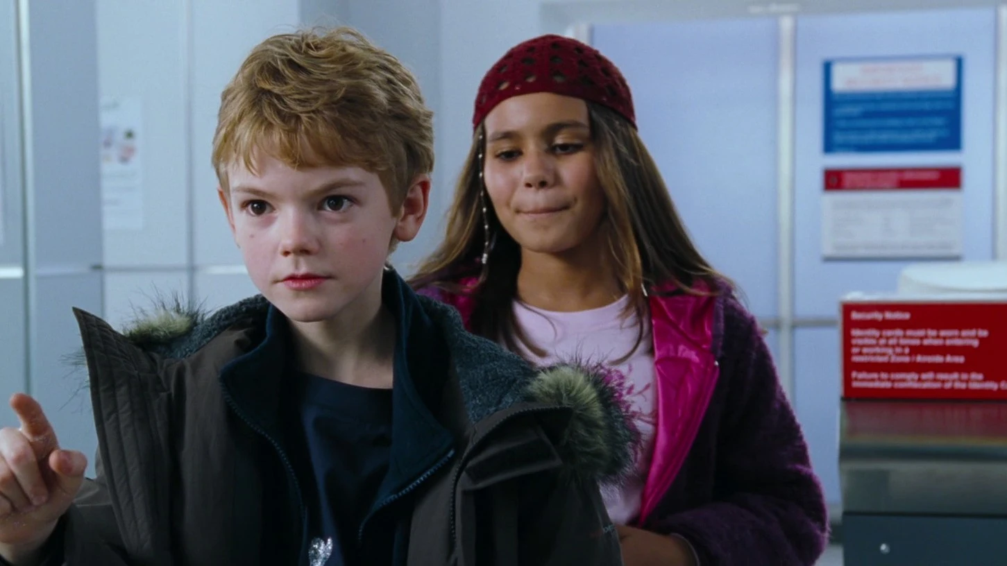 Thomas Brodie-Sangster y Olivia Olson en 'Love Actually' Thomas Brodie-Sangster y Olivia Olson en 'Love Actually'