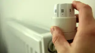 Un dial de radiador de calefacción central en una casa Un dial de radiador de calefacción central en una casa