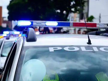 Un coche de la policía Un coche de la policía