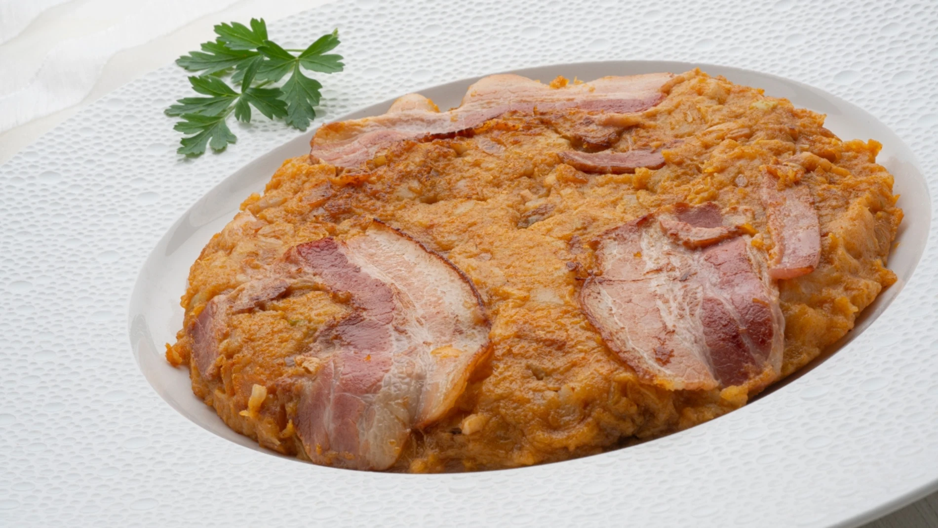 Trinxar con bacon, la receta sabrosa y completa de Karlos Arguiñano