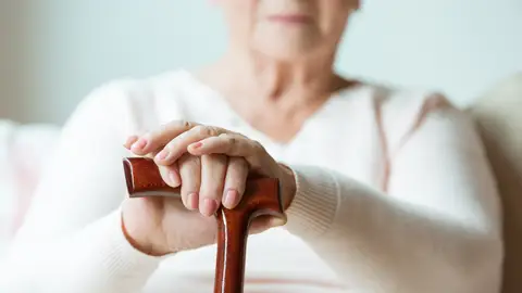 Mujer con bastón Mujer con bastón