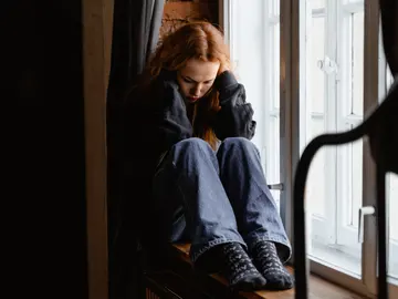 Una mujer pensativa Una mujer pensativa