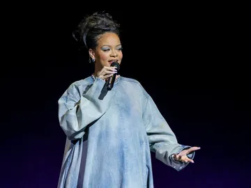 Rihanna en la CinemaCon presentando 'The Smurf Movie' donde pondrá voz a Pitufina Rihanna en la CinemaCon presentando 'The Smurf Movie' donde pondrá voz a Pitufina