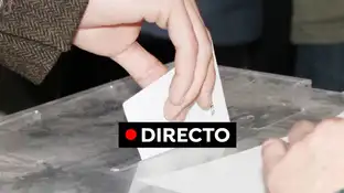 Una urna de votación Una urna de votación