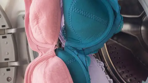 Lavadora con sujetadores Lavadora con sujetadores