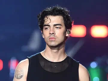 Joe Jonas en un concierto con los Jonas Brothers Joe Jonas en un concierto con los Jonas Brothers
