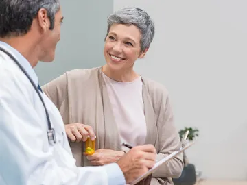 Una mujer en la consulta para hablar de la menopausia Una mujer en la consulta para hablar de la menopausia