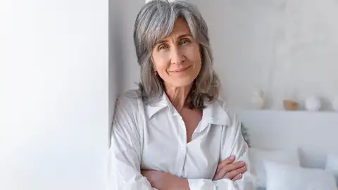 Una mujer sonriente Una mujer sonriente
