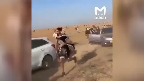 Personas escapando de un festival en Israel Personas escapando de un festival en Israel