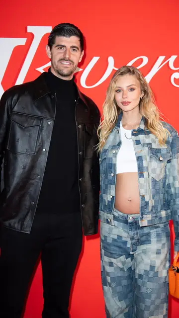 Mishel Gerzig y Thibaut Courtois en el desfile de Louis Vuitton Mishel Gerzig y Thibaut Courtois en el desfile de Louis Vuitton