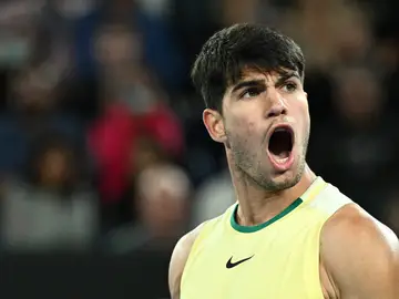 Carlos Alcaraz celebra un punto en su duelo ante Miomir Kecmanovic en octavos del Open de Australia Carlos Alcaraz celebra un punto en su duelo ante Miomir Kecmanovic en octavos del Open de Australia