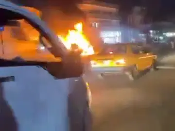 El coche ardiendo El coche ardiendo