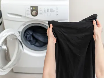 Lavadora de ropa negra Lavadora de ropa negra