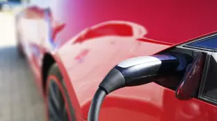 Imagen de archivo de un coche eléctrico Imagen de archivo de un coche eléctrico