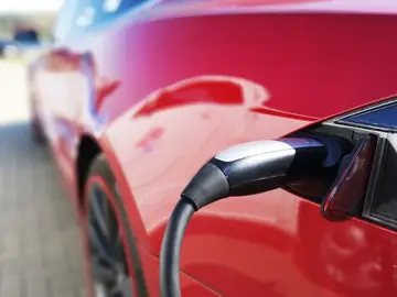 Imagen de archivo de un coche eléctrico Imagen de archivo de un coche eléctrico