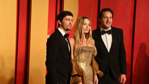 Margot Robbie con su marido y su socio