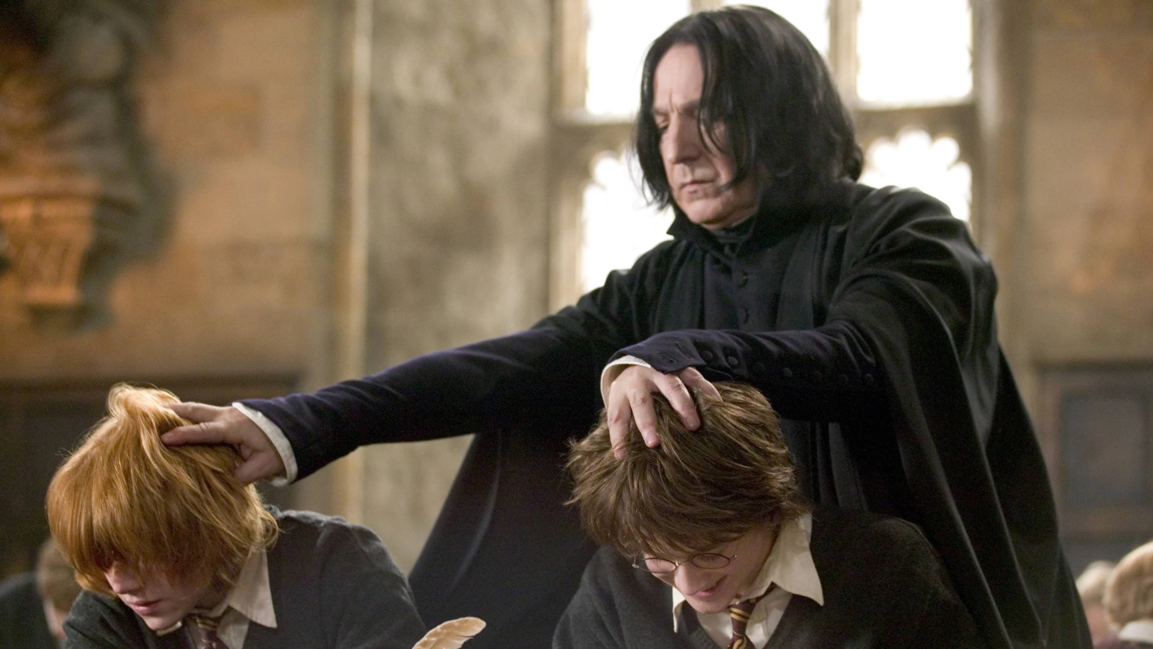 Alan Rickman, Daniel Radcliffe y Rupert Grint en una escena de Harry Potter Alan Rickman, Daniel Radcliffe y Rupert Grint en una escena de Harry Potter