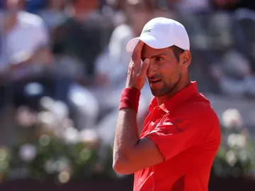 Novak Djokovic reacciona tras un punto ante Alejandro Tabilo Novak Djokovic reacciona tras un punto ante Alejandro Tabilo