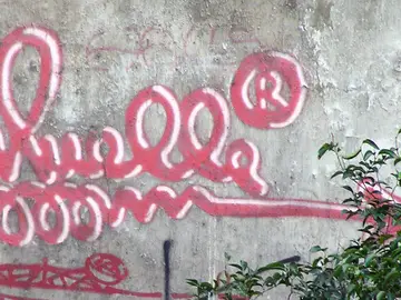 Un grafiti del icono de la Movida Madrileña, Muelle, será restaurado y protegido tras aparecer en las obras de rehabilitación de un edificio Un grafiti del icono de la Movida Madrileña, Muelle, será restaurado y protegido tras aparecer en las obras de rehabilitación de un edificio