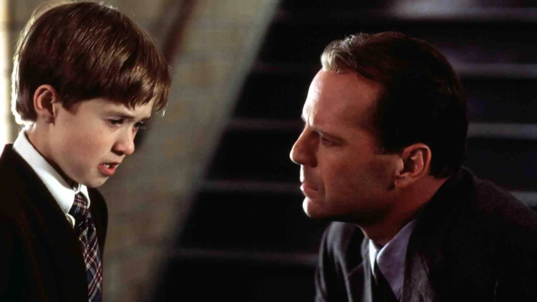 Haley Joel Osment y Bruce Willis en El Sexto Sentido