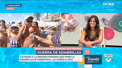 Plantan la sombrilla a primera hora de la mañana en Torrevieja Plantan la sombrilla a primera hora de la mañana en Torrevieja
