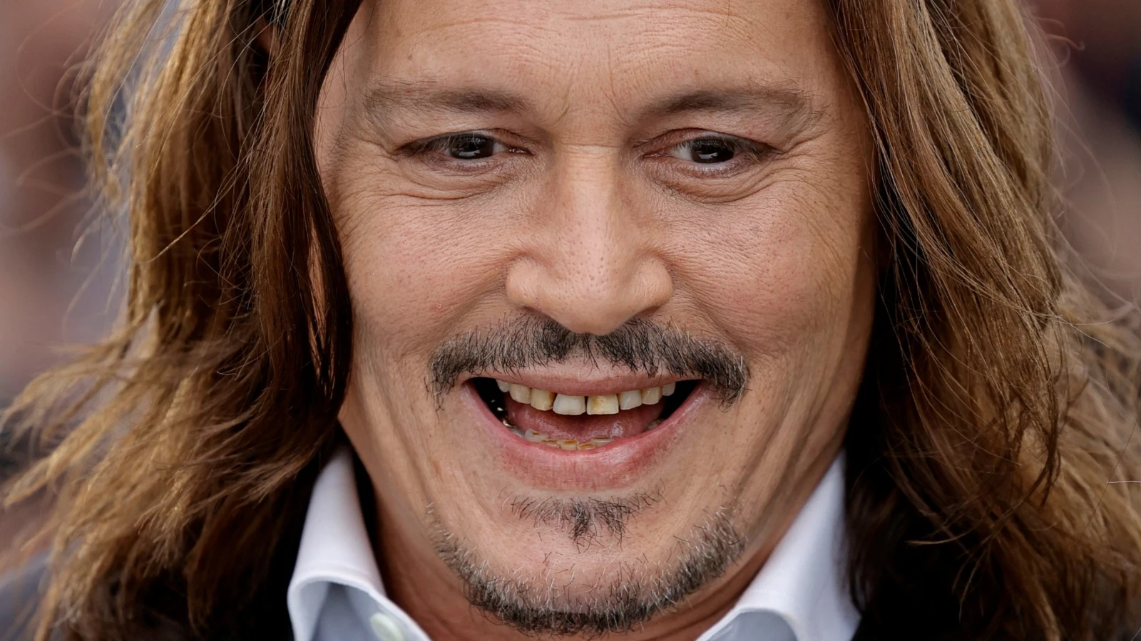 Johnny Depp con sus dientes "podridos" Johnny Depp con sus dientes "podridos"