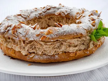 Receta de París-Brest con crema de praliné, de Eva Arguiñano: "Un postre fácil con forma de rueda y una historia muy bonita" Receta de París-Brest con crema de praliné, de Eva Arguiñano: "Un postre fácil con forma de rueda y una historia muy bonita"