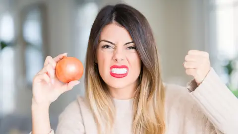 Una mujer con una cebolla Una mujer con una cebolla