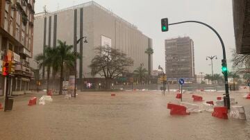 Calle inundada en el centro de Málaga