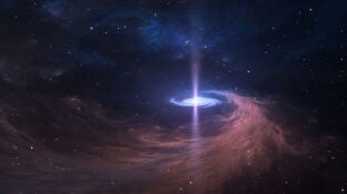 Agujero negro supermasivo en el espacio