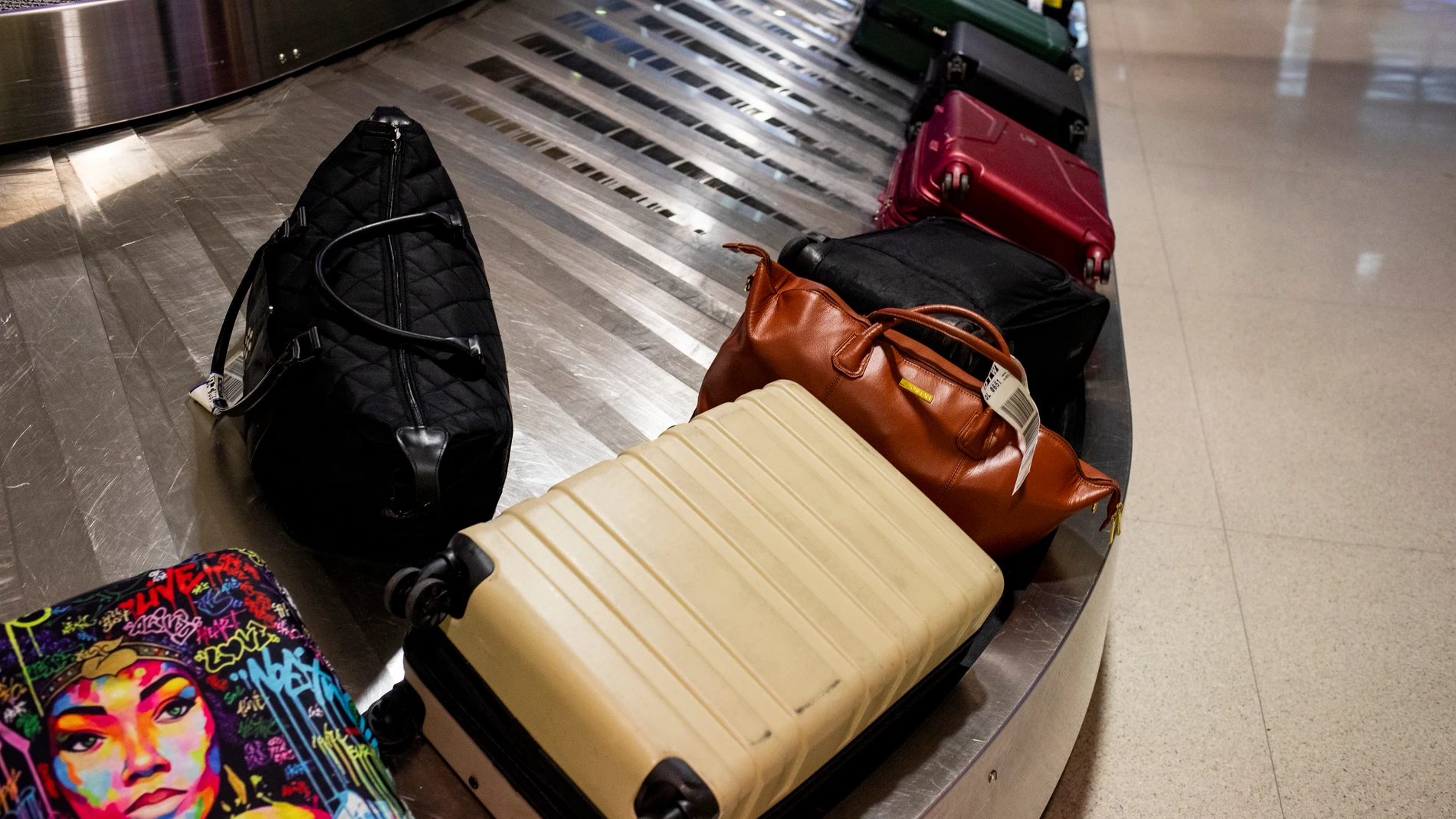 Imagen de archivo de maletas en un aeropuerto. Imagen de archivo de maletas en un aeropuerto.