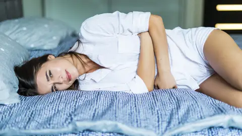 Mujer con dolor Mujer con dolor