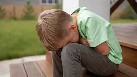 Niño con dolor Niño con dolor