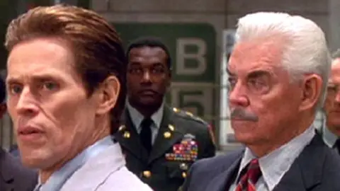 Willem Dafoe y Jack Betts en SpiderMan (2002) Willem Dafoe y Jack Betts en SpiderMan (2002)