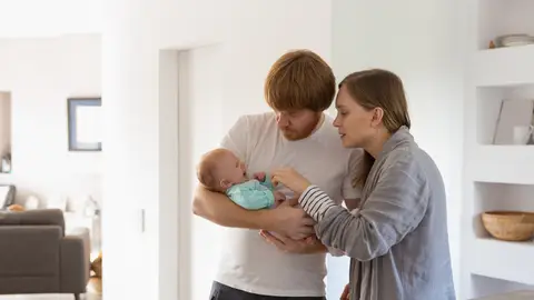 Pareja con su bebé Pareja con su bebé