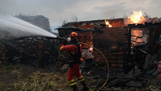 Bombero en incendio Bombero en incendio