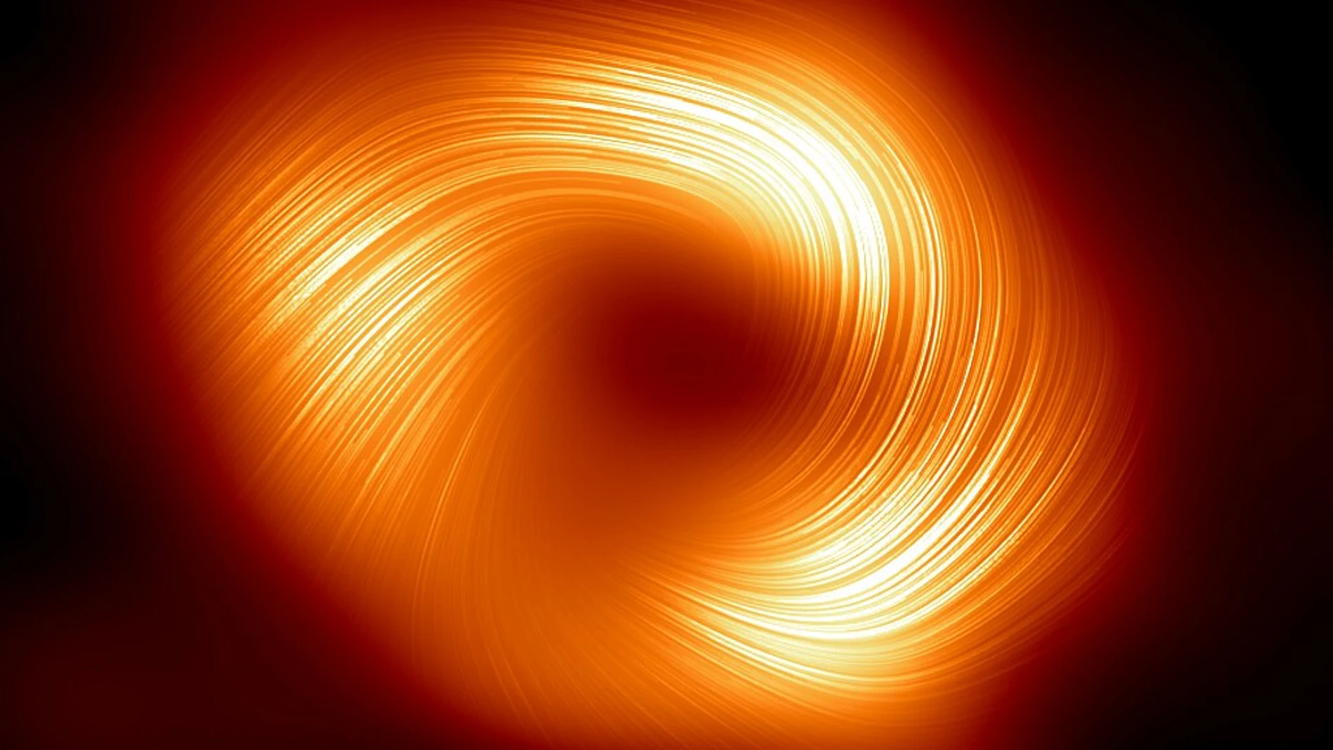 Sagitario A* fotografiado por el Telescopio del Horizonte de Sucesos en luz polarizada. Sagitario A* fotografiado por el Telescopio del Horizonte de Sucesos en luz polarizada.