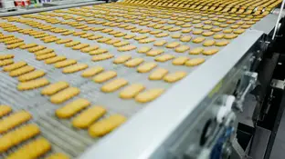 Imagen de archivo de galletas en una fábrica Imagen de archivo de galletas en una fábrica