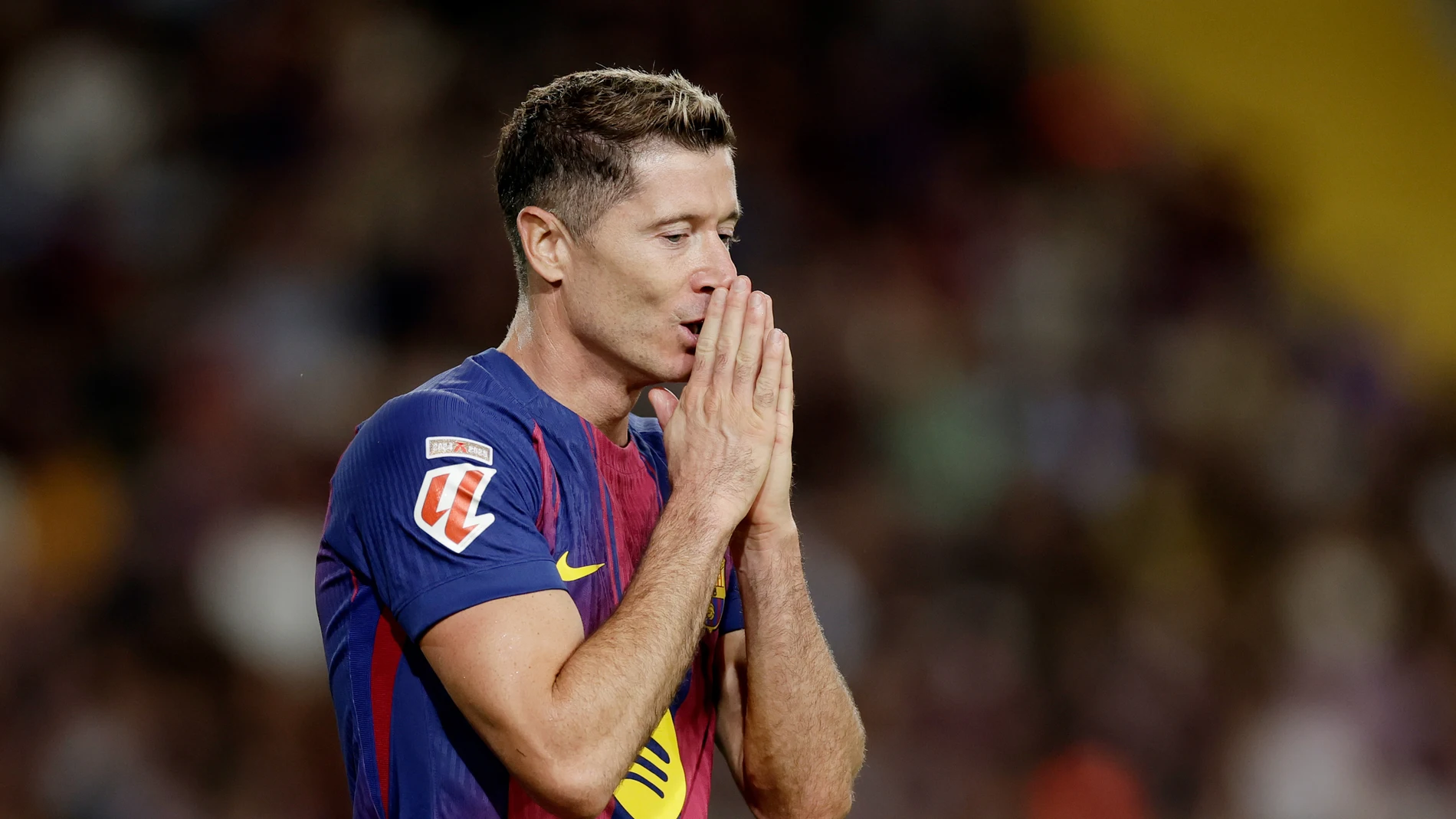 Lewandowski en un partido con el Barça Lewandowski en un partido con el Barça
